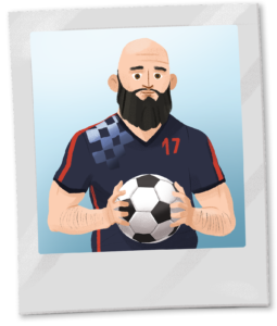 A bald man with a beard holds a soccer ball